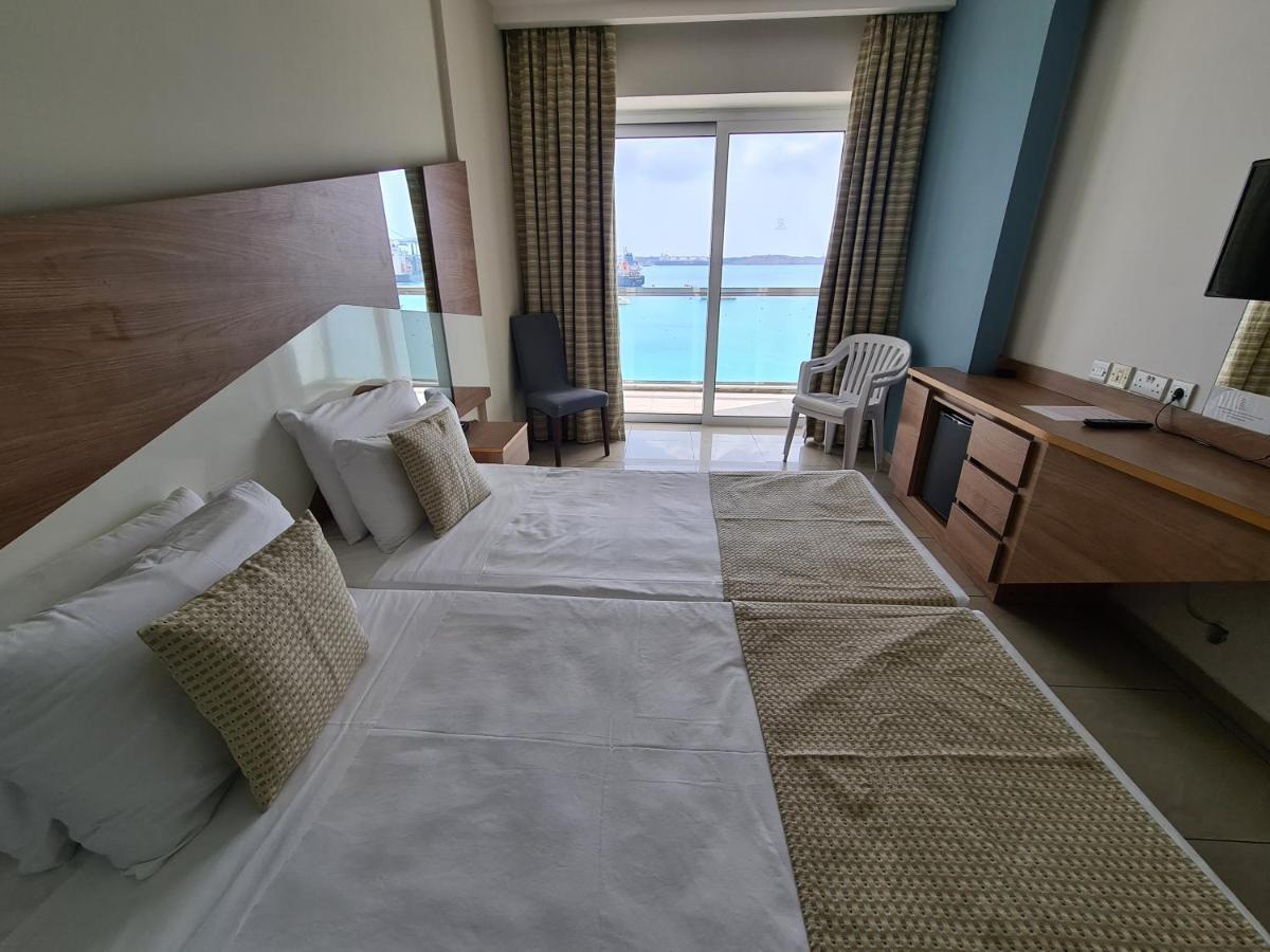 Water'S Edge Hotel Бирзеббуджа Экстерьер фото